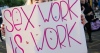 striscione "lavoro sessuale è lavoro"